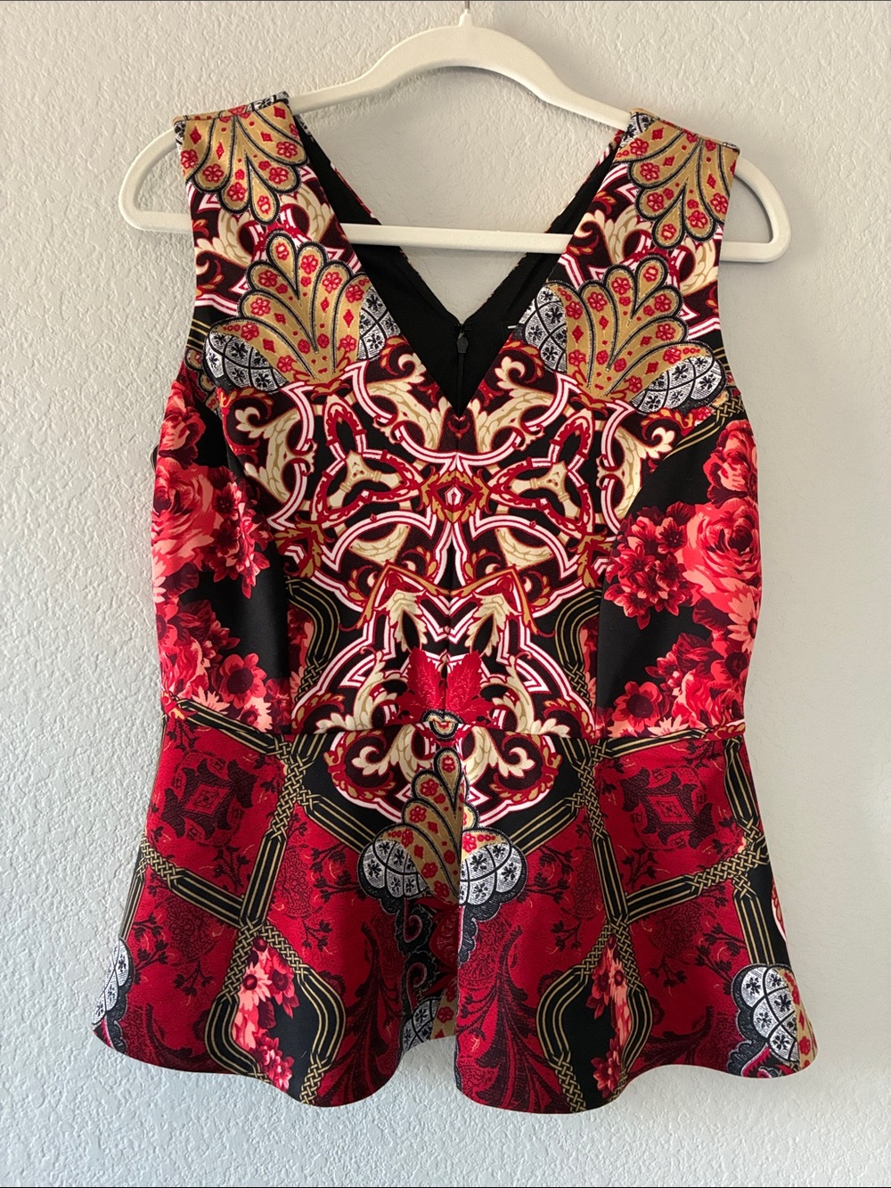 Red Floral & Ornate Sleeveless Peplum Blouse